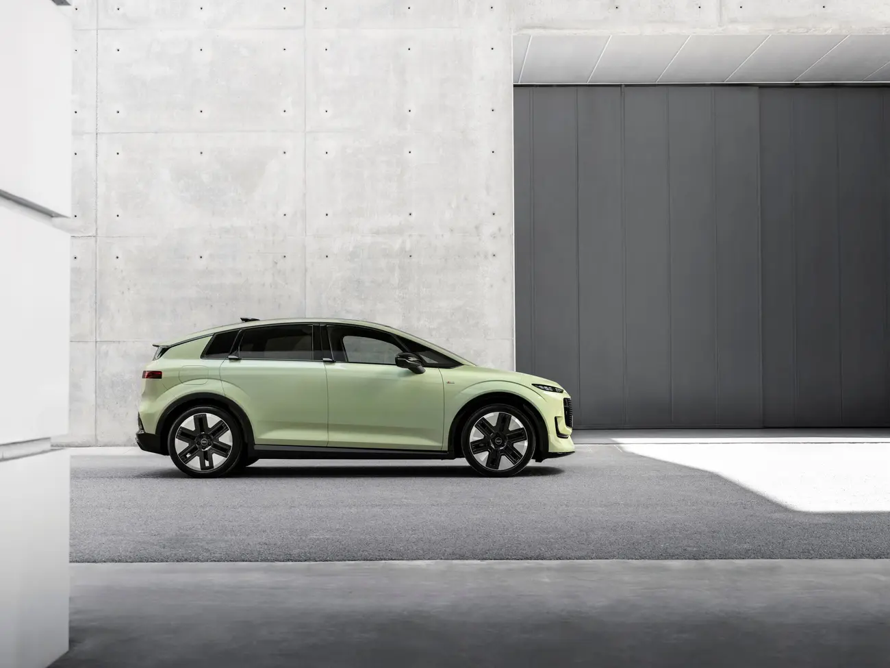Audi A2 e-tron in side profile, showing its compact body and aerodynamic wheels