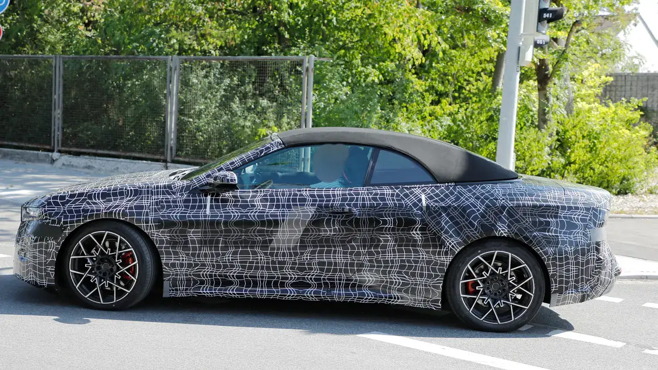 Camouflaged BMW i4 Convertible prototype during road testing