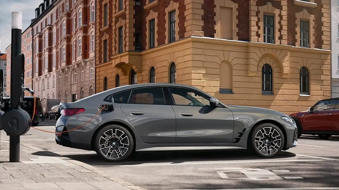 BMW i4 eDrive40 in side profile, showing the five-door Gran Coupé silhouette