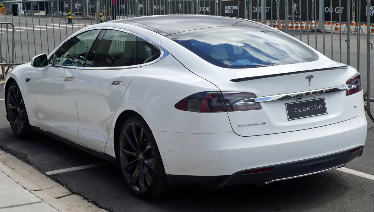 Used Tesla Model S seen from the rear on the road