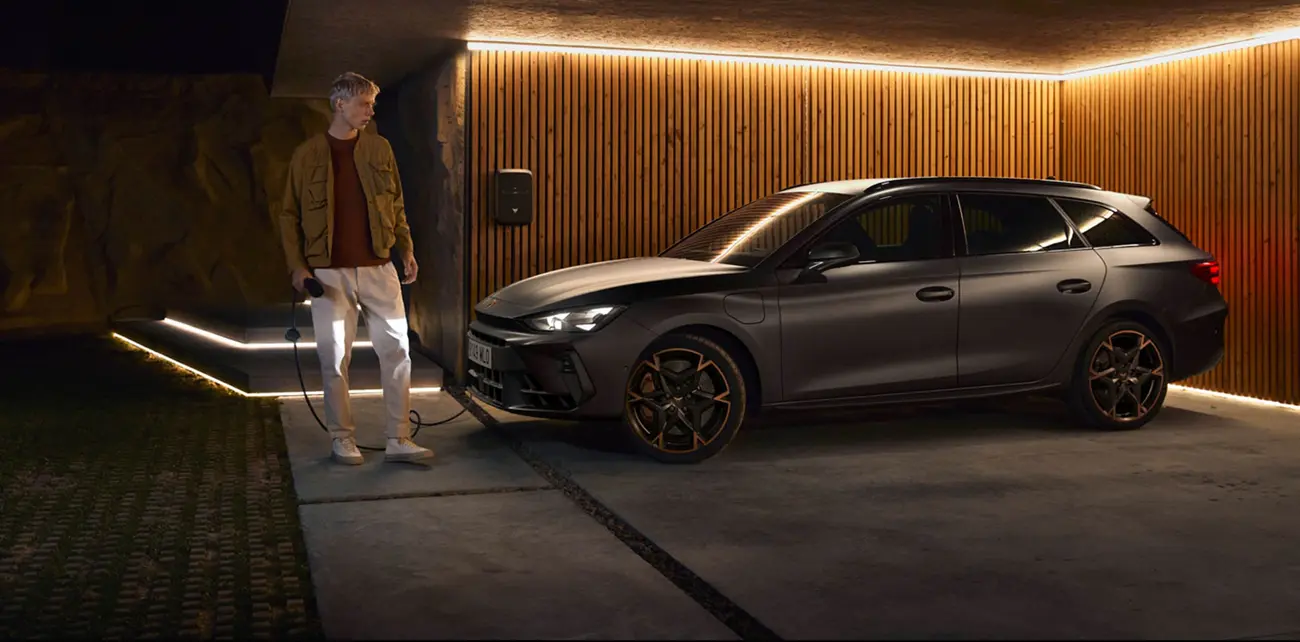 Plug-in hybrid plugged into a home charging point by cable