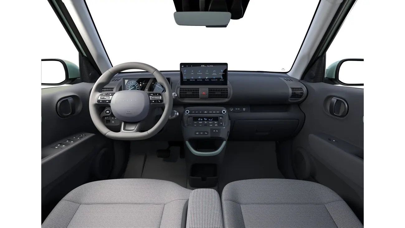 Hyundai Inster Lounge cabin with leather and cloth seats and mint green accents