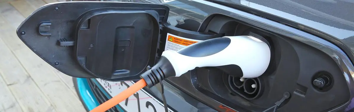 Kia e-Niro CCS charging port with the connector plugged in