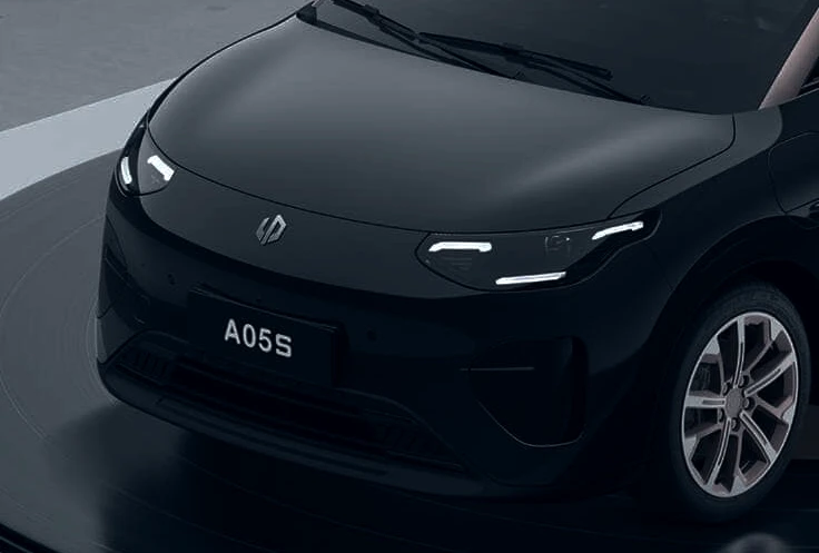 Leapmotor A05S in a front three-quarter view, a compact electric hatchback with a floating roof