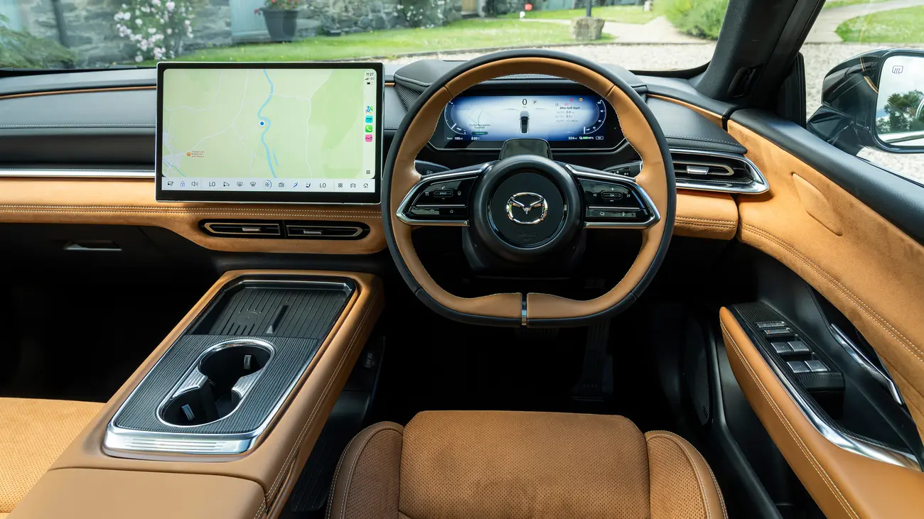 Mazda 6e interior with 14.6-inch central screen and leather and suede trim
