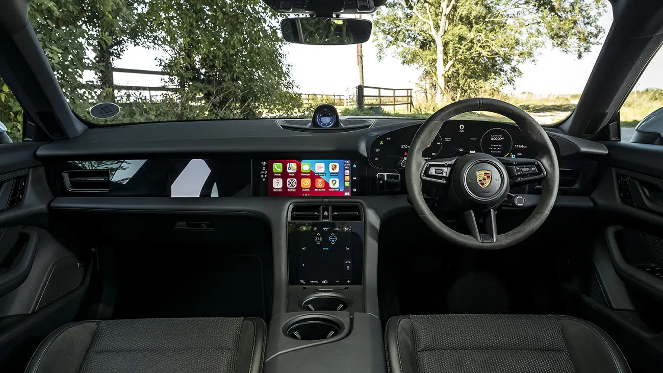 Porsche Taycan interior with curved digital instrument display