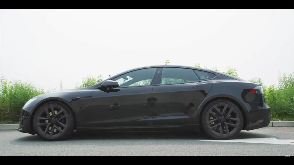 Tesla Model S in profile on a road, the most durable EV in the study