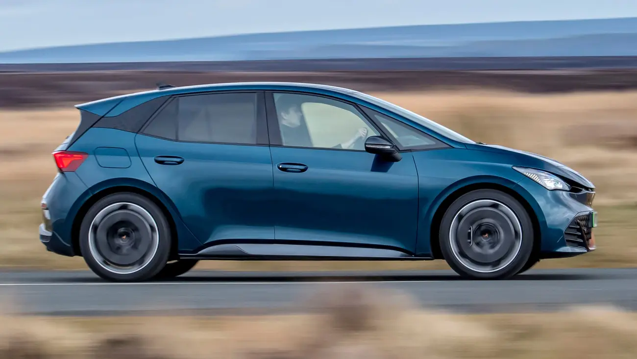 Cupra Born electric hatchback seen from the side on a road