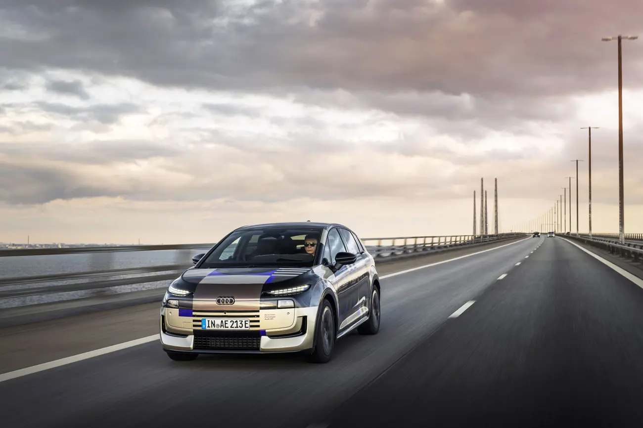 Audi A2 e-tron electric compact seen in side profile on the road