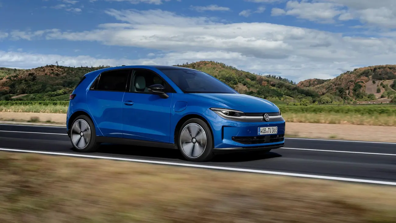 Volkswagen ID. Polo side profile driving on an open road